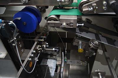 Máquina contadora y envasadora - para toallas femeninas